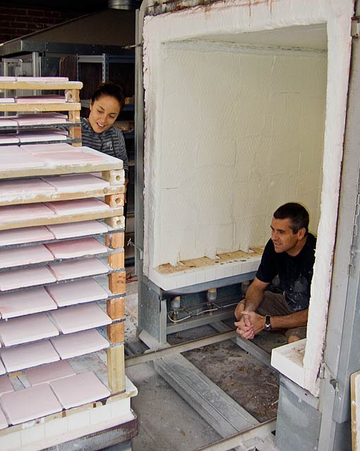 Birk and Pignolet inspecting loaded kiln